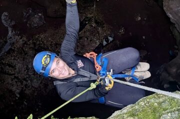 A happy Sierra descending into Natural Trap Cave.