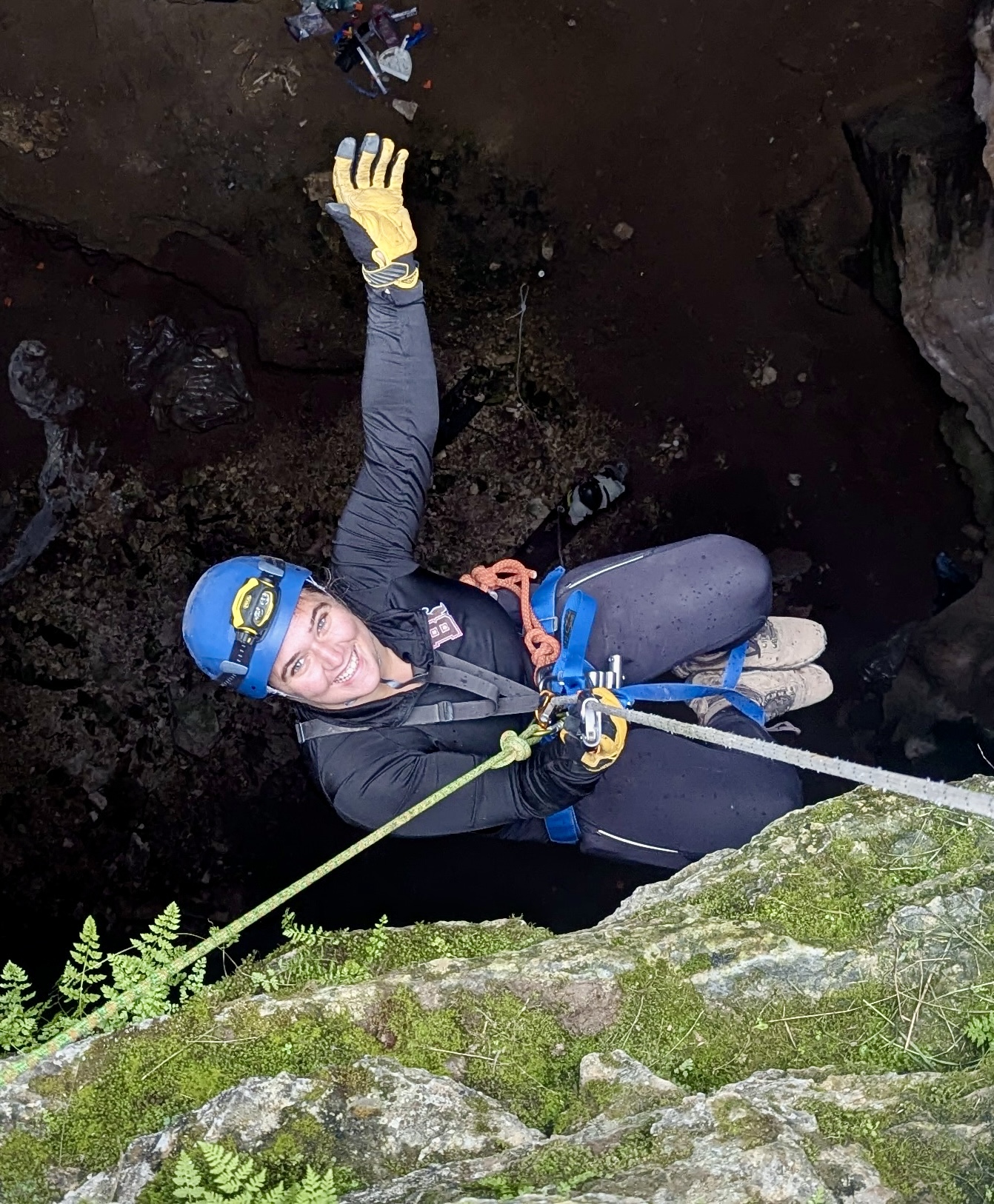 A happy Sierra descending into Natural Trap Cave.